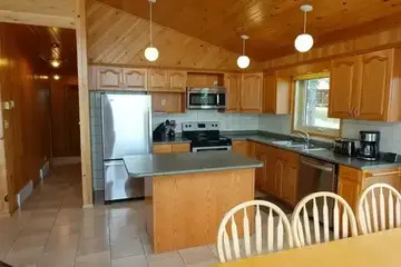 Big kitchen and island for cooking your favourite meals